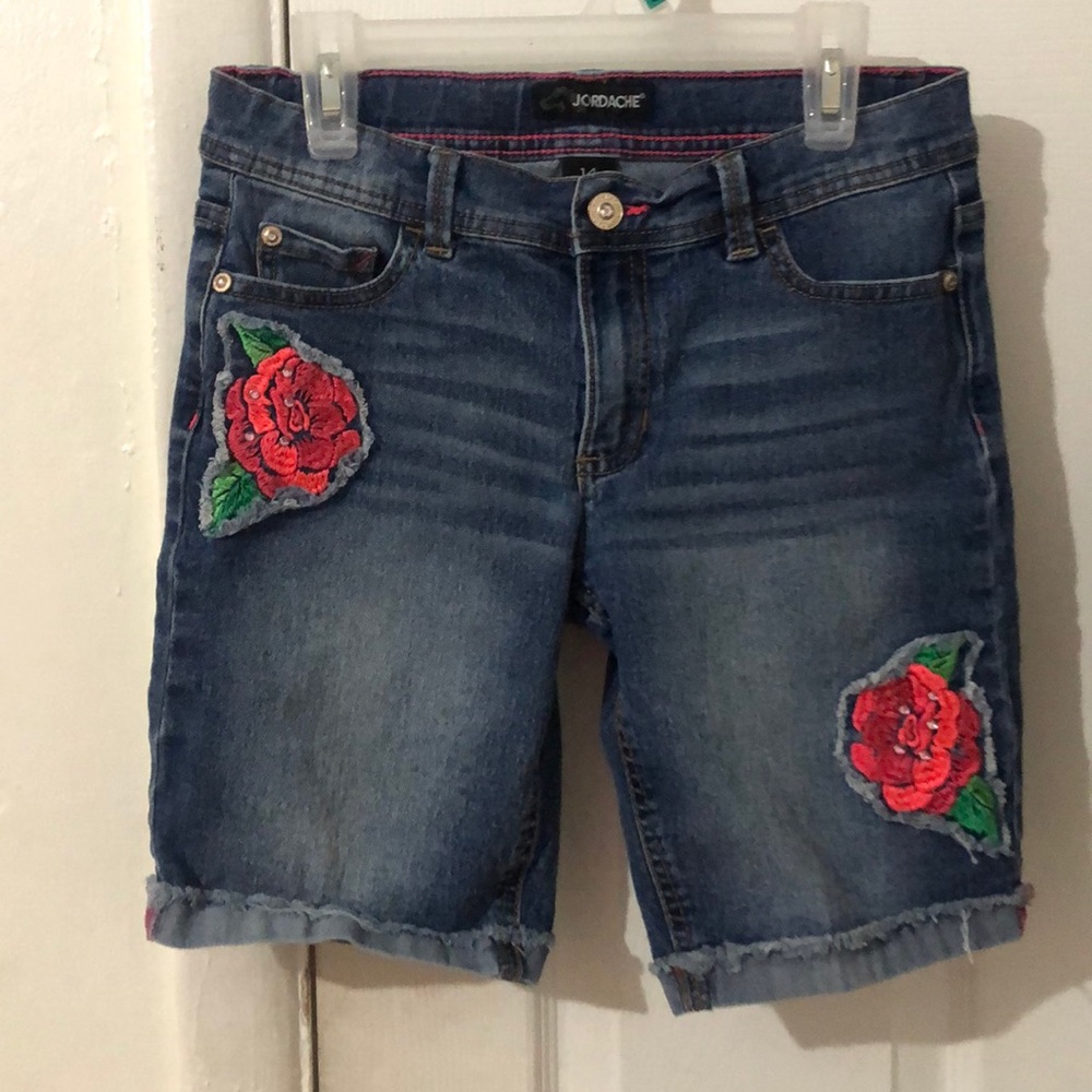navy blue shorts.